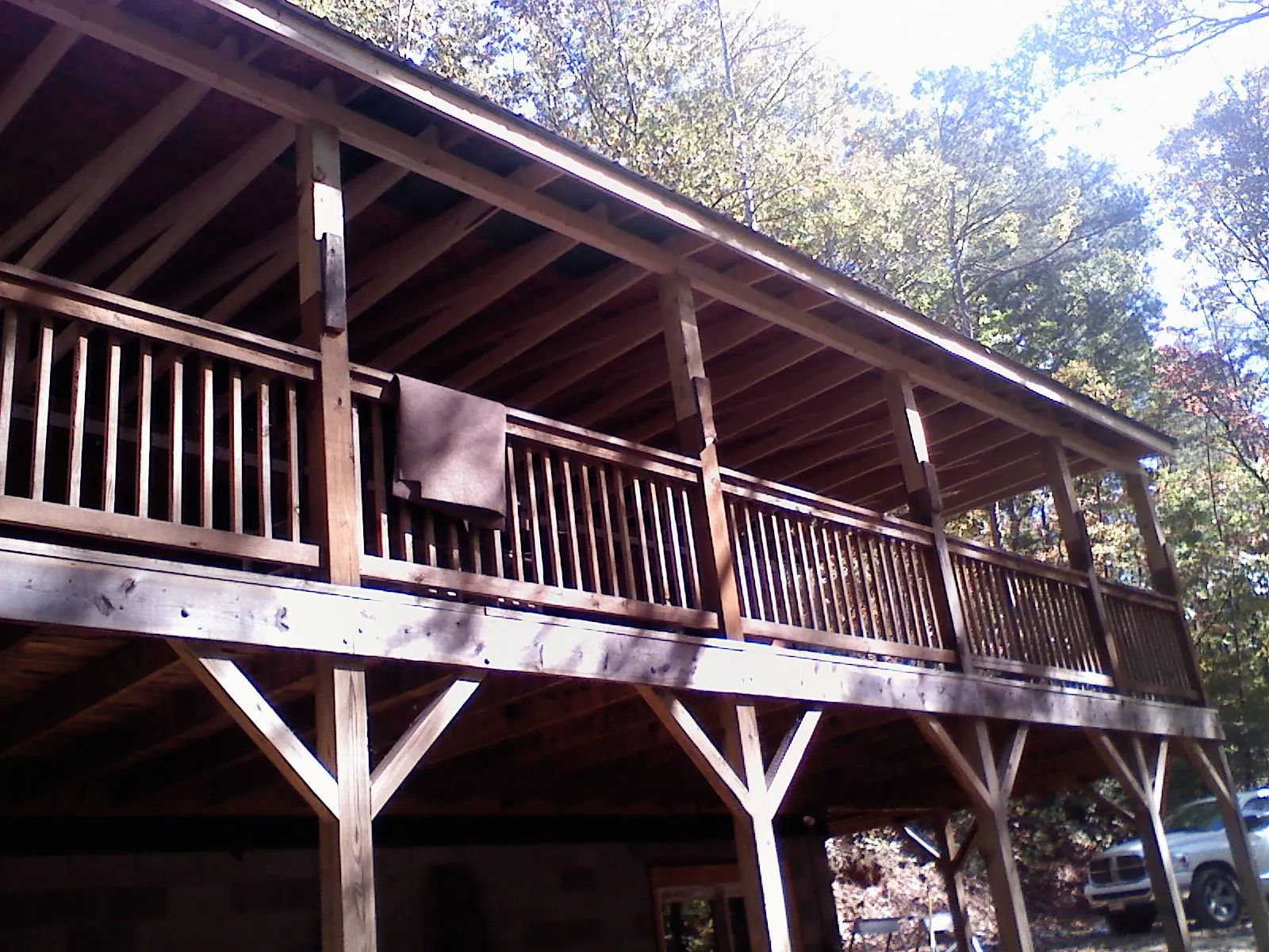 Timber framing under a new elevated porch and deck — Roof Leak Repair in Proctor by Roofing Brothers